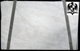 Quartzite Sky White <br>Fini : Poli - Lot : 10801 <br> Epaisseur : 1.25'' <br> Dimensions : +,- 122'' x 77'' <br> Indice de prix : $$$$$ <br> ARRIVAGE MI JUIN 2026