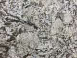 Granite Bianco Antico Premium <br>Fini : Antique - Lot : 17631 <br>Epaisseur : 1.25'' <br>Dimensions : +,-127'' x 78'' <br> Indice de prix : $$$ <br>