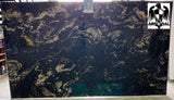Granite Titanium Gold Premium <br>Fini : Poli - Lot : 1854 <br>Epaisseur : 1.25'' <br>Dimensions : 129'' x 75'' <br> Indice de prix : $$$$ <br>