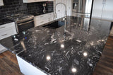Granite Titanium Premium <br>Fini : Poli - Lot : 116632 <br>Epaisseur : 1.25'' <br>Dimensions : +,-87'' x 78'' <br> Indice de prix : $$$$ <br>