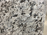 Granite New Azul Aran Premium <br>Fini : Poli -  Lot : 613103 <br>Epaisseur : 1.25''  <br>Dimensions : +,- 118'' x 75'' <br> Indice de prix : $$$ <br>