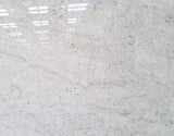 Granite Colonial White Premium <br>Fini : Poli -  Lot : 46125  <br>Epaisseur : 1.25''  <br> Dimensions : +,- 119'' x 73'' <br> Indice de prix : $$$ <br> ARRIVAGE JANVIER 2027