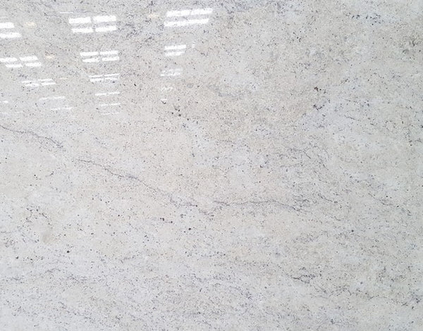Granite Colonial White Premium <br>Fini : Poli -  Lot : 46125  <br>Epaisseur : 1.25''  <br> Dimensions : +,- 119'' x 73'' <br> Indice de prix : $$$ <br> ARRIVAGE JANVIER 2027