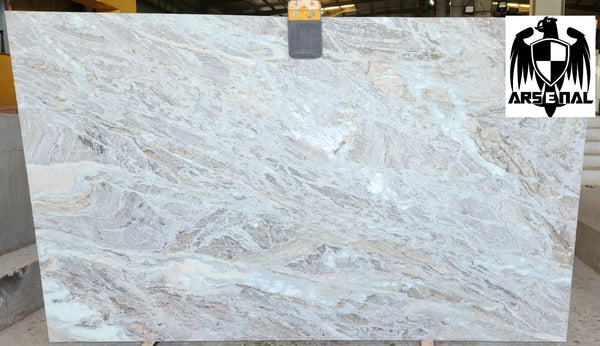 Quartzite Fantasy Brown Premium  <br>Fini : Poli -  Lot :  3127 <br>Epaisseur : 1.25''  <br>Dimensions : 121'' x 78'' <br> Indice de prix : $$ <br> ARRIVAGE OCTOBRE 2025
