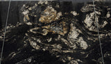 Granite Titanium Gold Premium  <br>Fini : Poli -  Lot : 11171 <br>Epaisseur : 1.25''  <br>Dimensions :  126'' x 76'' <br> Indice de prix : $$$$ <br> ARRIVAGE MARS 2026
