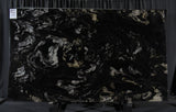 Granite Titanium  Premium <br>Fini : Poli -  Lot : 9823 <br>Epaisseur : 1.25''  <br>Dimensions : +,-132'' x 77'' <br> Indice de prix : $$$$ <br> ARRIVAGE NOVEMBRE 2025