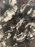 Granite Titanium  Premium <br>Fini : Poli -  Lot : 116632 <br>Epaisseur : 1.25''  <br>Dimensions : +,-124'' x 77'' <br> Indice de prix : $$$$ <br>