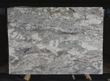 Granite Taupe White Premium  <br>Fini : Poli -  Lot : 006 <br>Epaisseur : 1.25''  <br>Dimensions : +,- 110'' x 76'' <br> Indice de prix : $$$ <br>