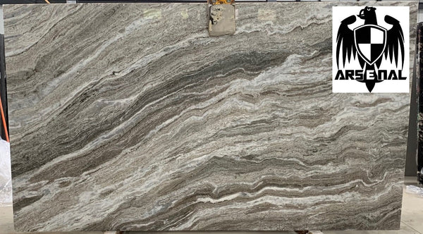 Quartzite Fantasy Brown Premium  <br>Fini : Poli -  Lot :  391065 <br>Epaisseur : 1.25''  <br>Dimensions : +,- 123'' x 60'' <br> Indice de prix : $$$ <br>