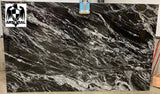 Granite Oscuro Mist Premium  <br>Fini : Poli -  Lot : 1239763  <br>Epaisseur : 1.25''  <br>Dimensions :  +,- 121' x 74'' <br> Indice de prix : $$$ <br>